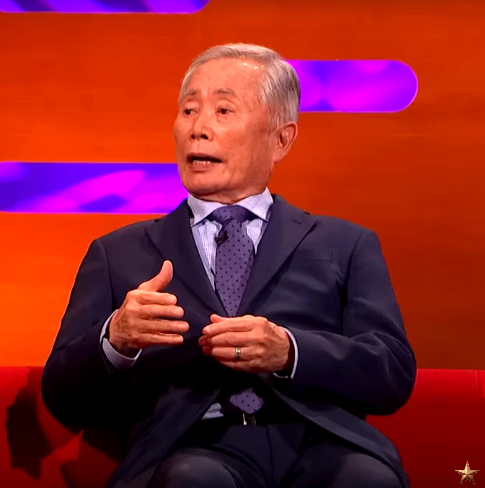 closeup of him doing an interview