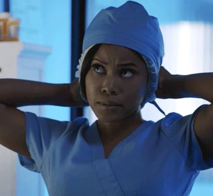 nurse putting on a head cap