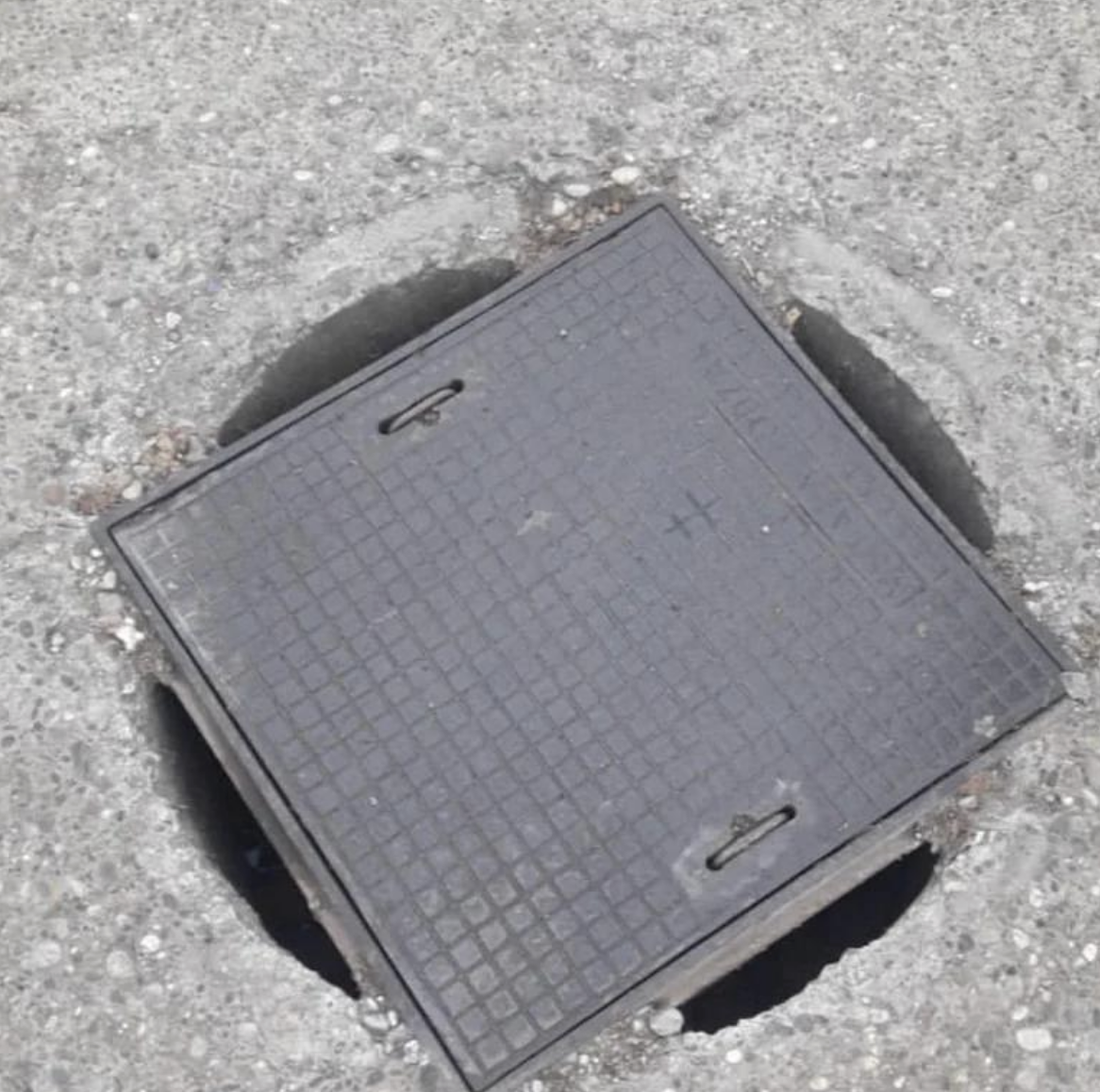 square cover on top of the circle hole