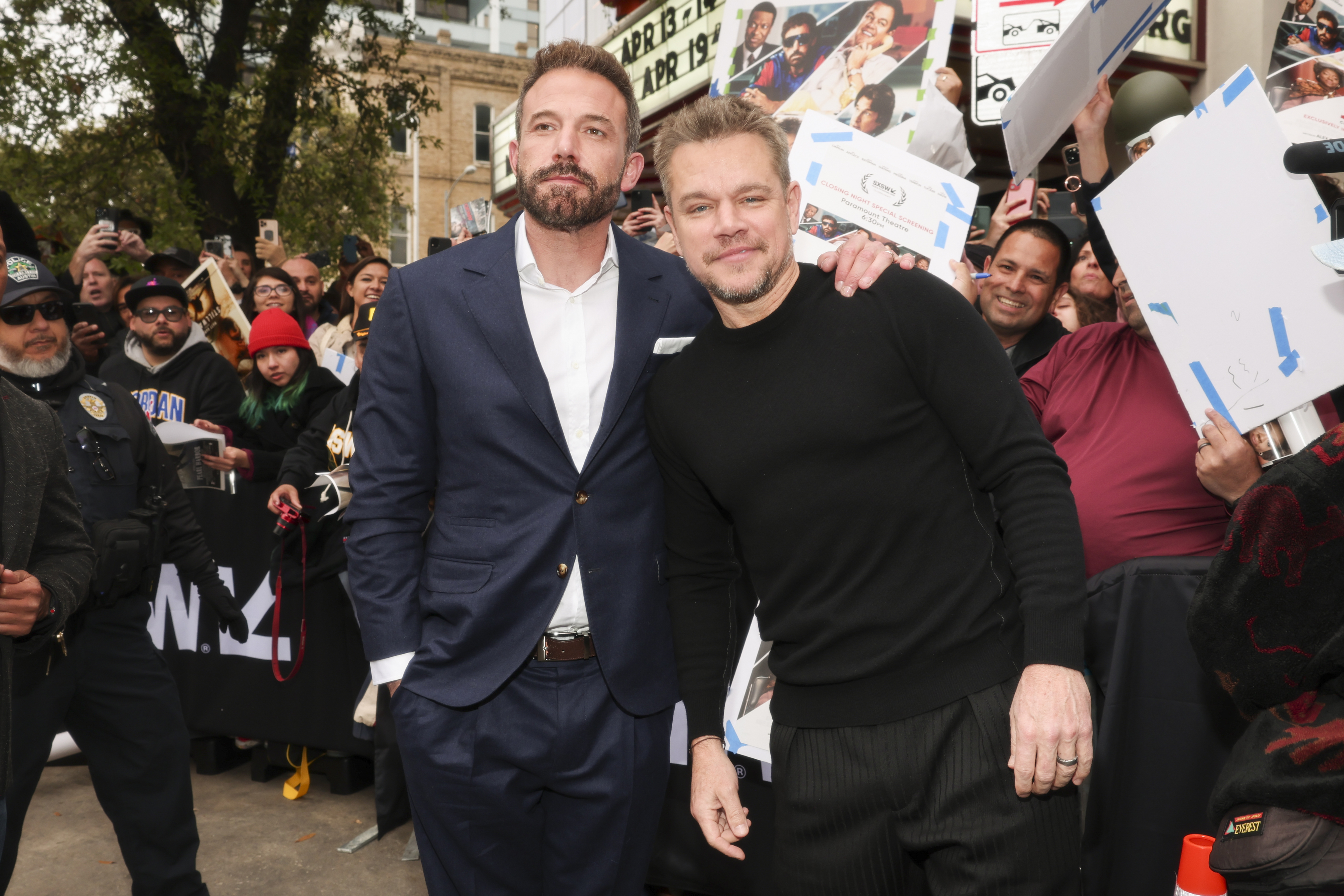 Ben and Matt standing together at a public event