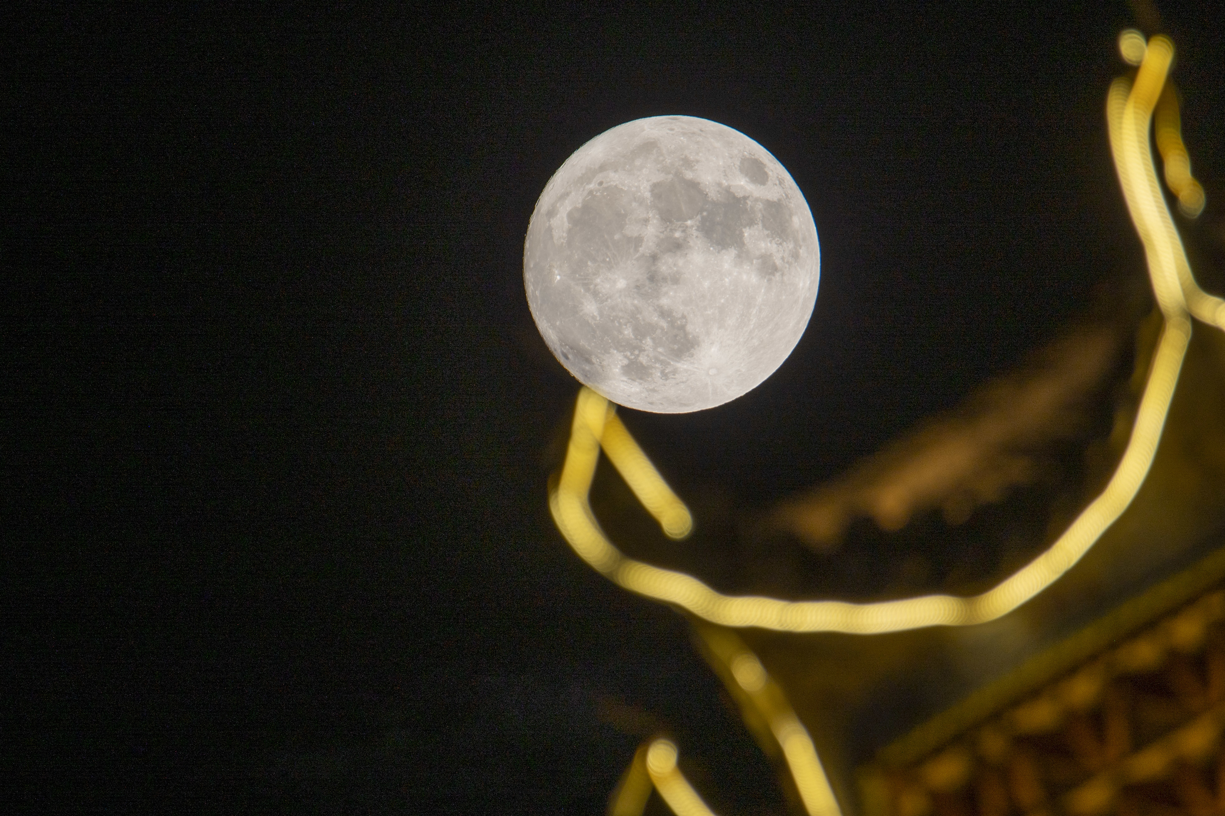 The supermoon is seen above Gulou Ecological Square in China&#x27;s Guizhou province