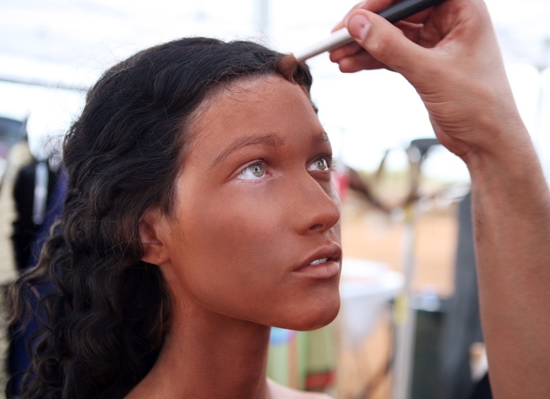 A model having her face painted