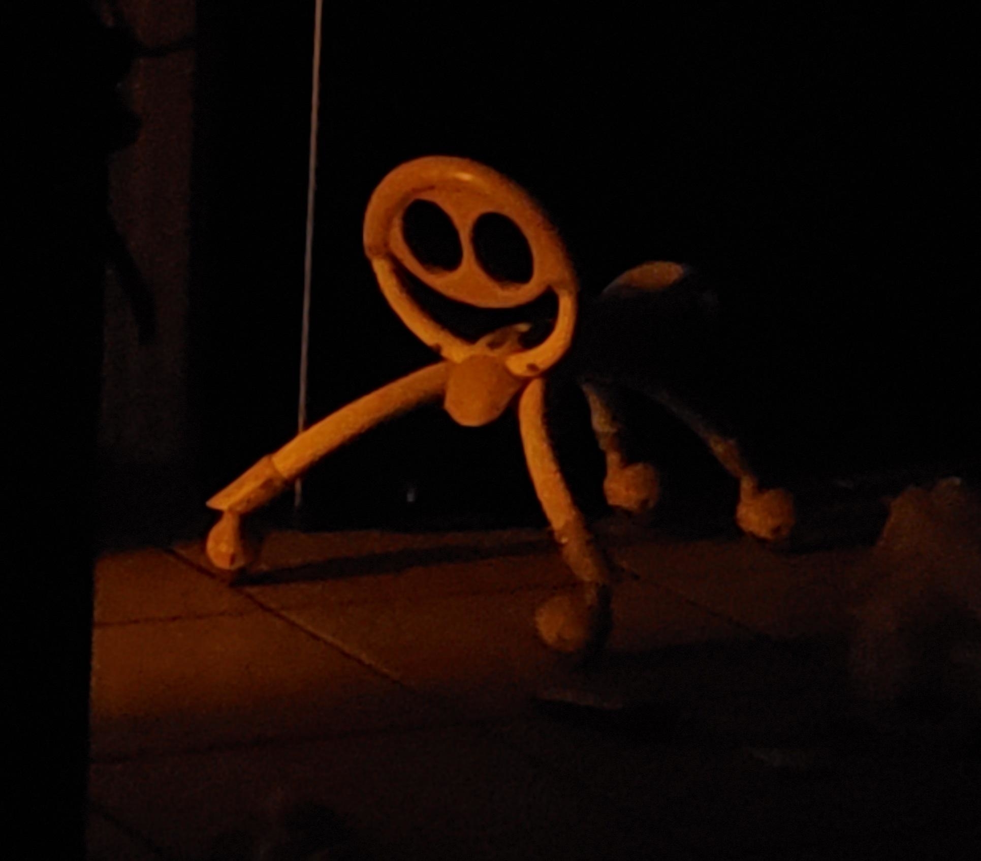A smiley scooter in the dark