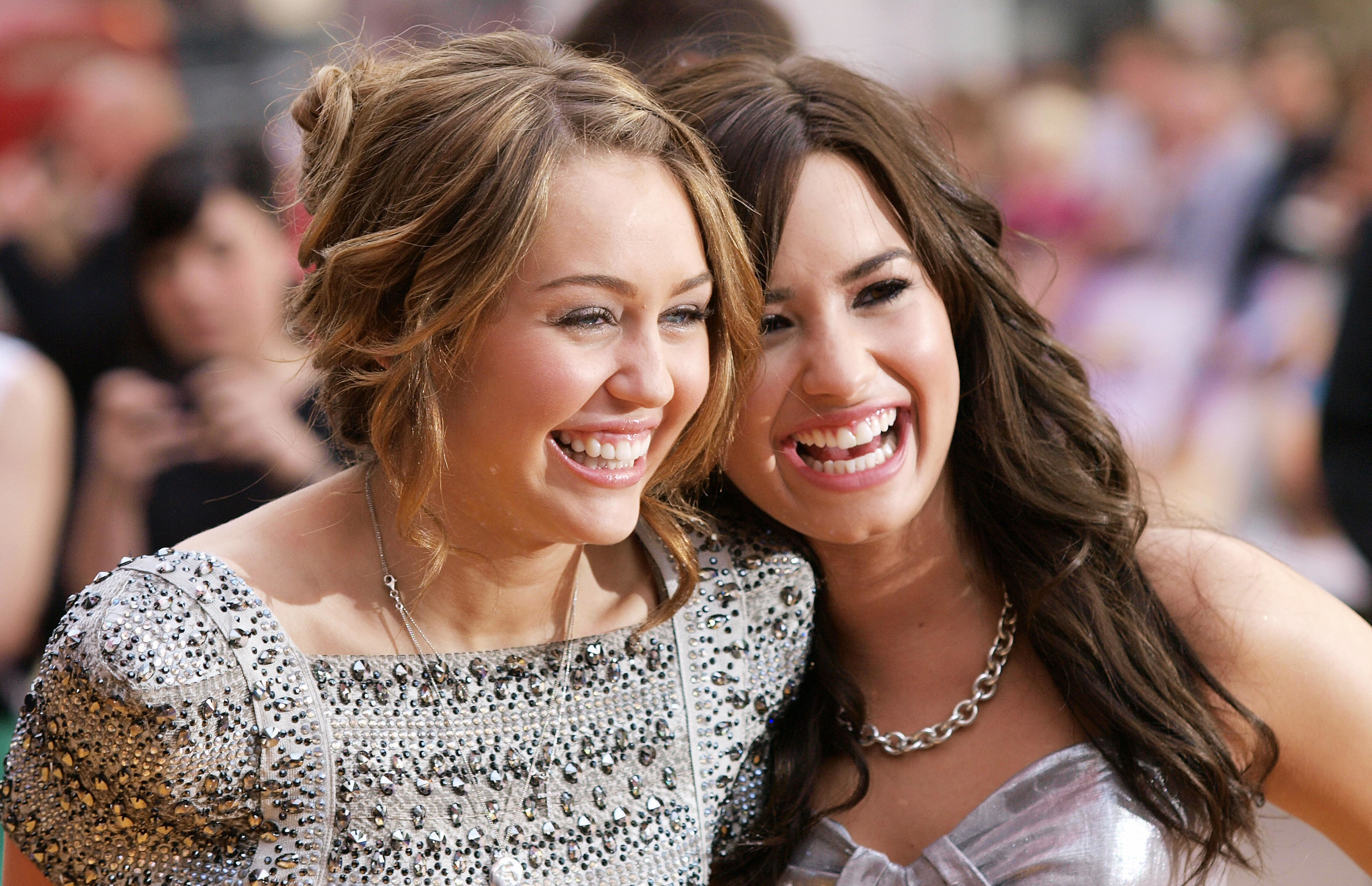 Closeup of Miley and Demi smiling on the red carpet