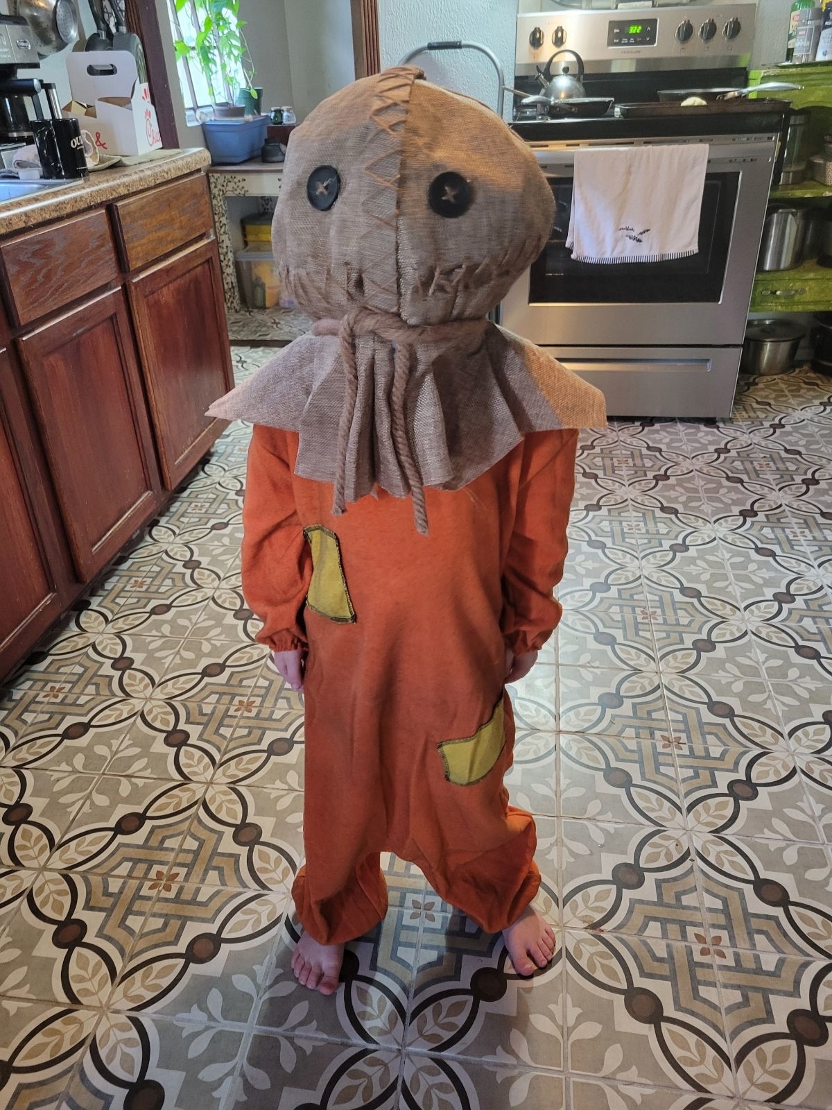 A little boy in a Halloween costume