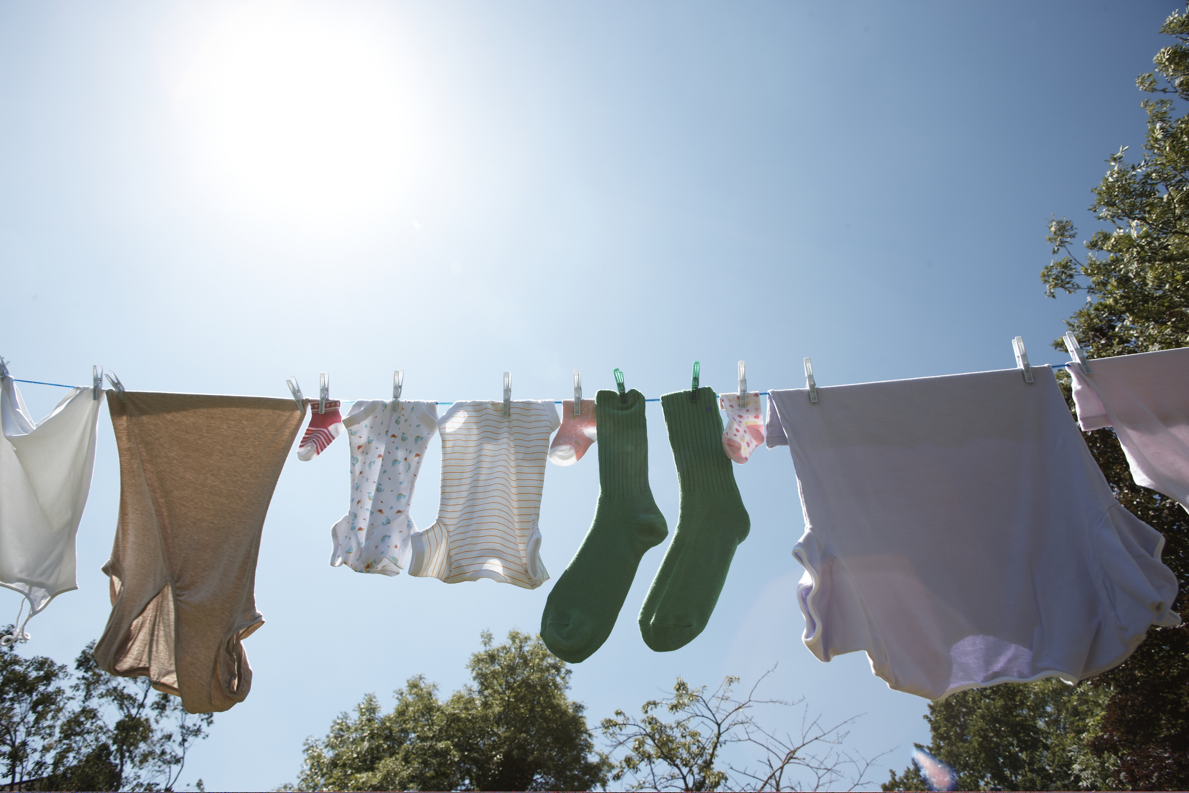 clothes hanging on a line in the sun