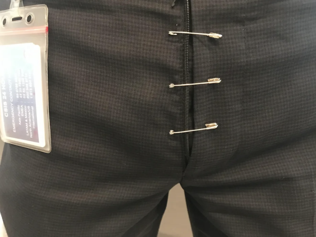 Safety pins holding someone&#x27;s pants together