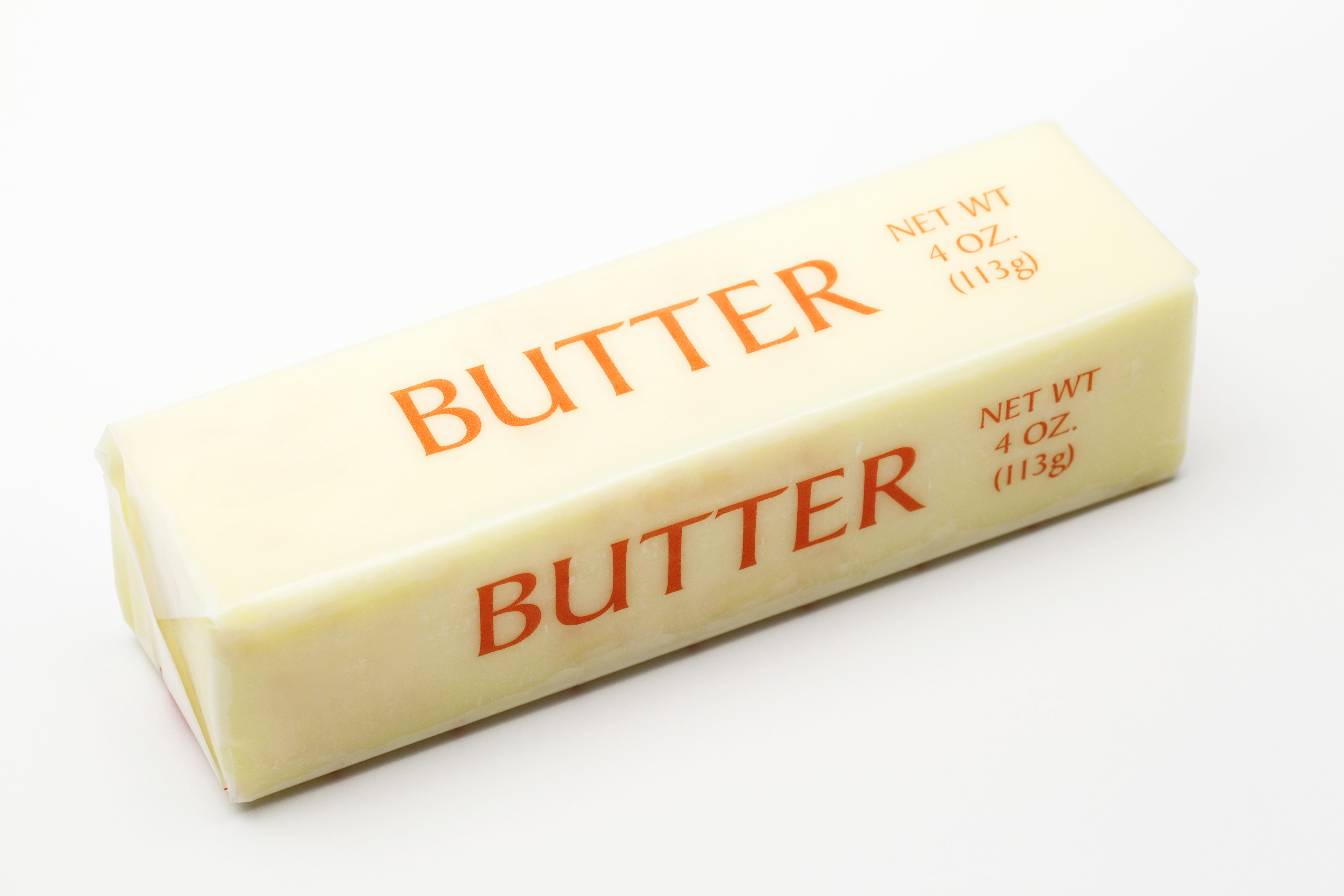 stick of butter in paper wrapping