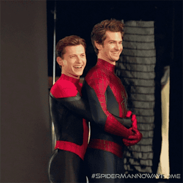 two spidermans in a prom-like holding position