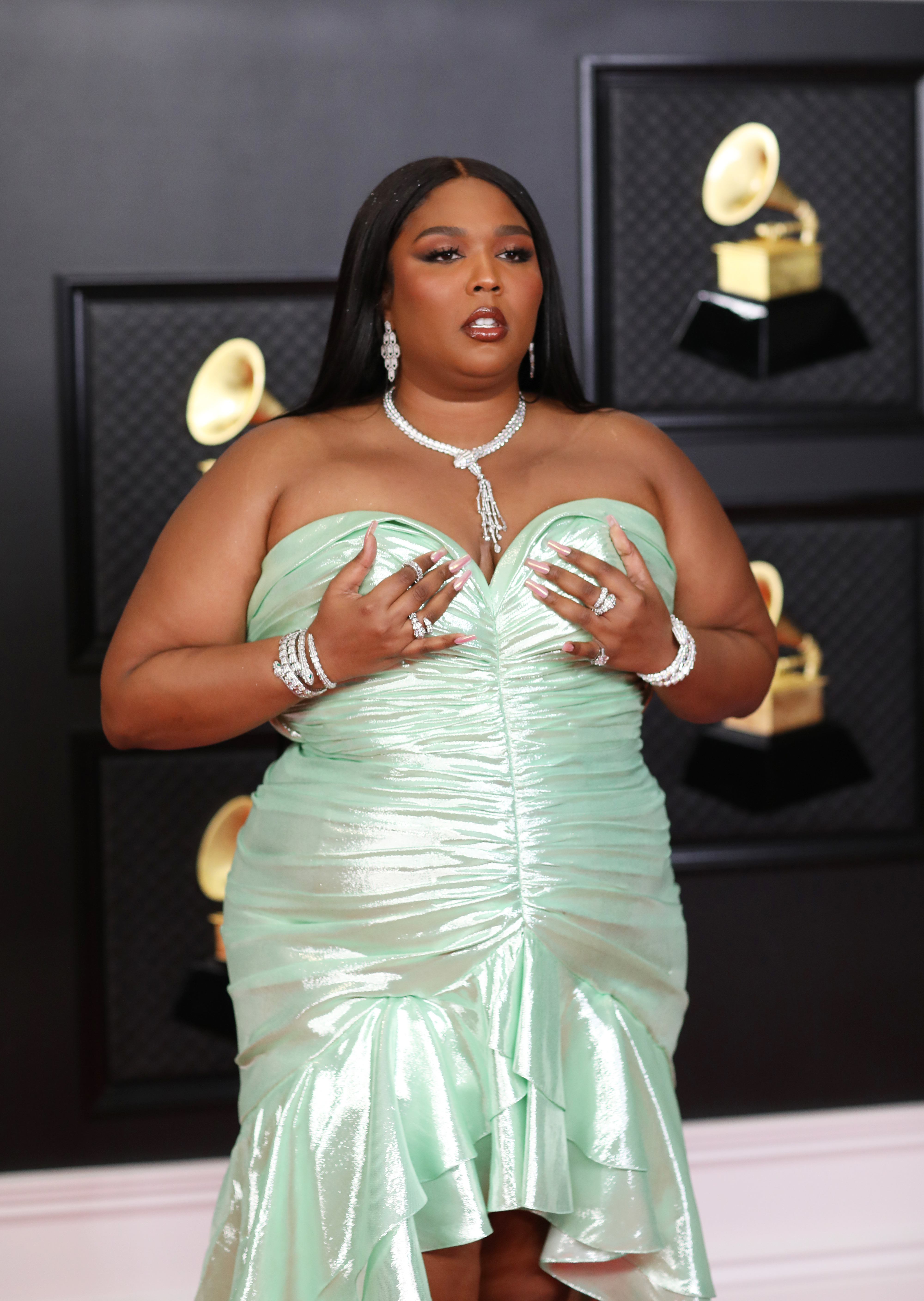 Close-up of Lizzo at the Grammys in a strapless gown