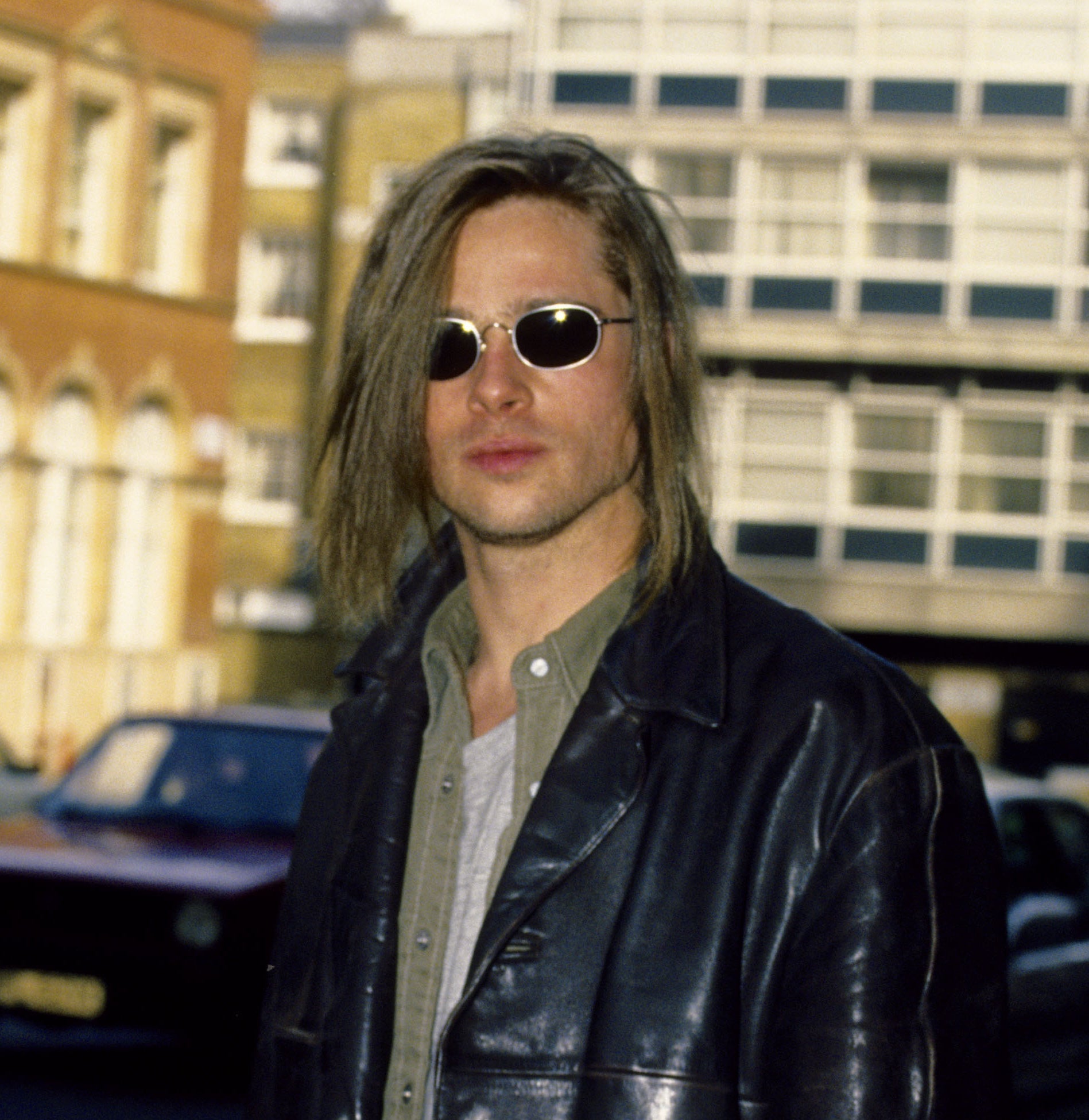 Close-up of Brad in a leather jacket and sunglasses