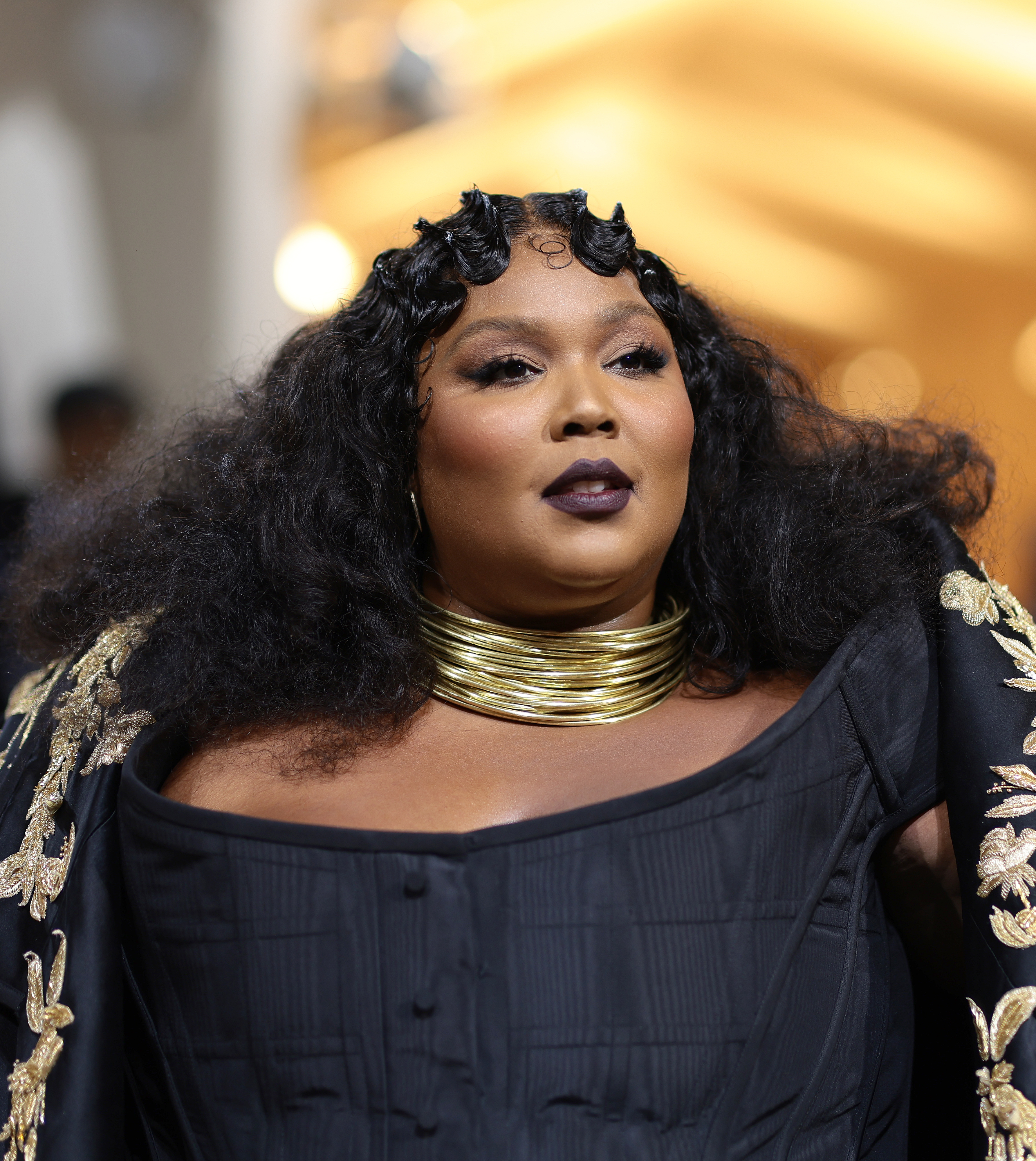 Close-up of Lizzo at a media event