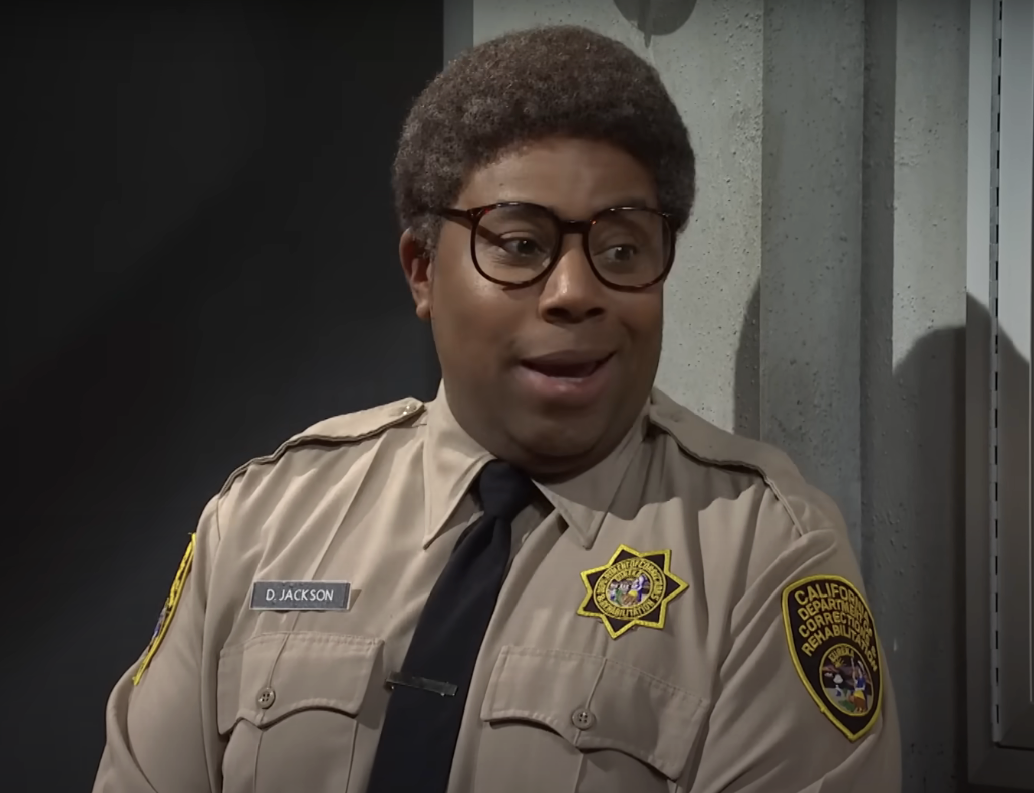 Kenan Thompson as a corrections officer on Saturday Night Live
