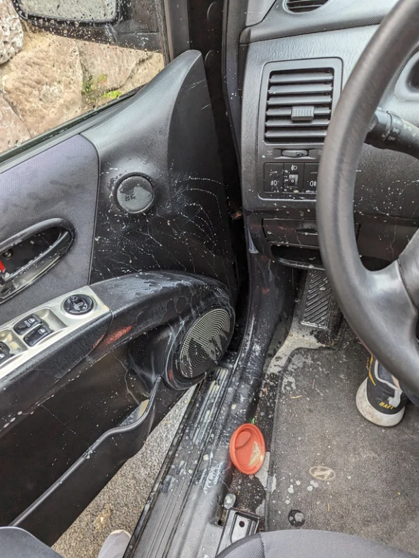 Coffee spilled all over a person&#x27;s car