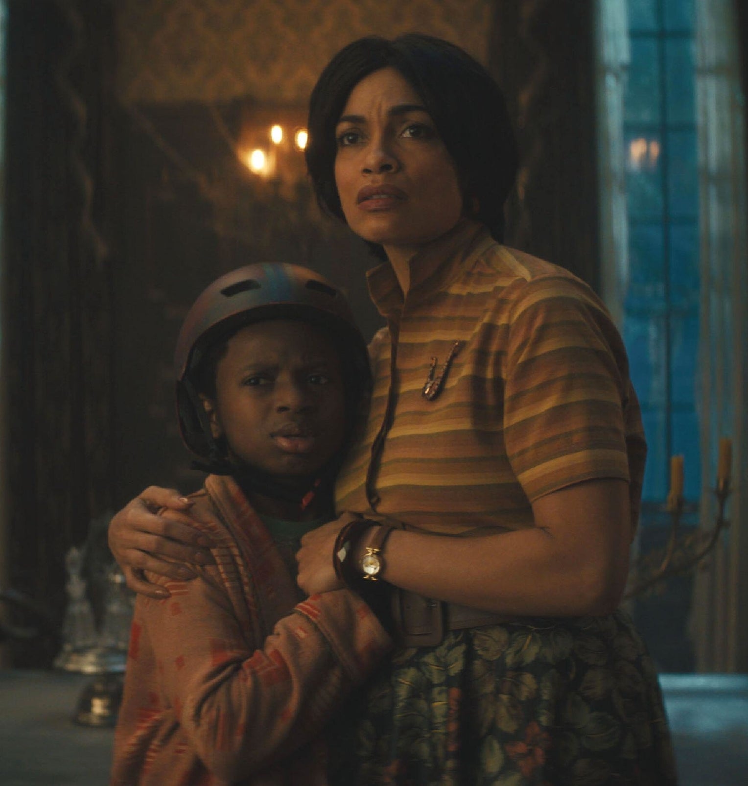 Chase Dillon and Rosario Dawson in Haunted Mansion