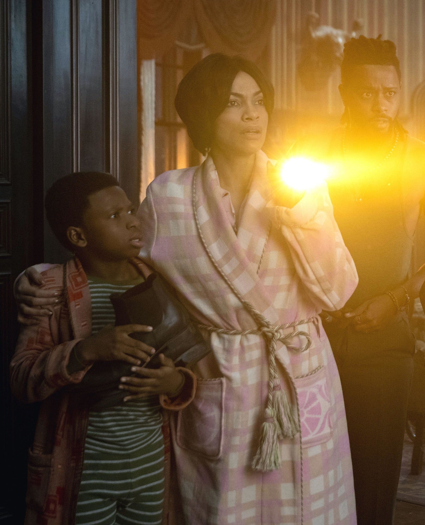 Chase Dillon, Rosario Dawson, and LaKeith Stanfield in Haunted Mansion