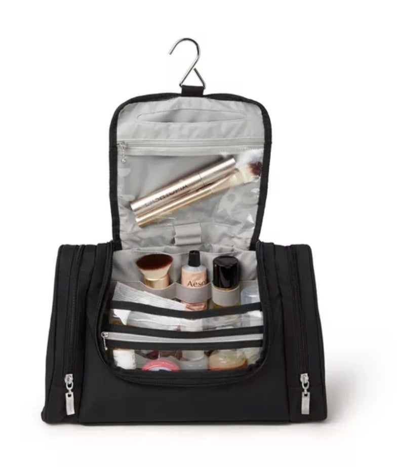 a hanging toiletry bag filled with makeup