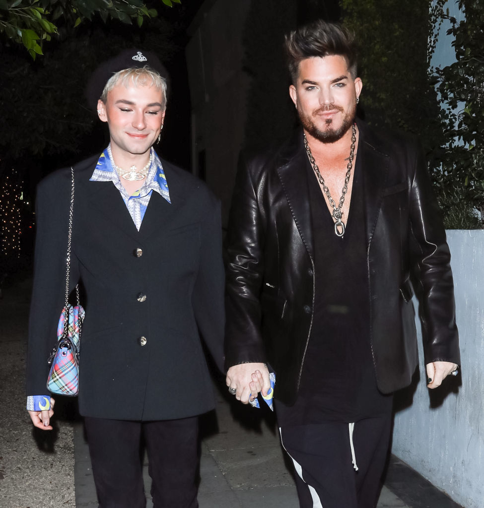 Oliver Gliese and Adam Lambert holding hands