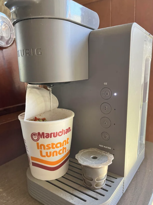 A Keurig being used for ramen noodles