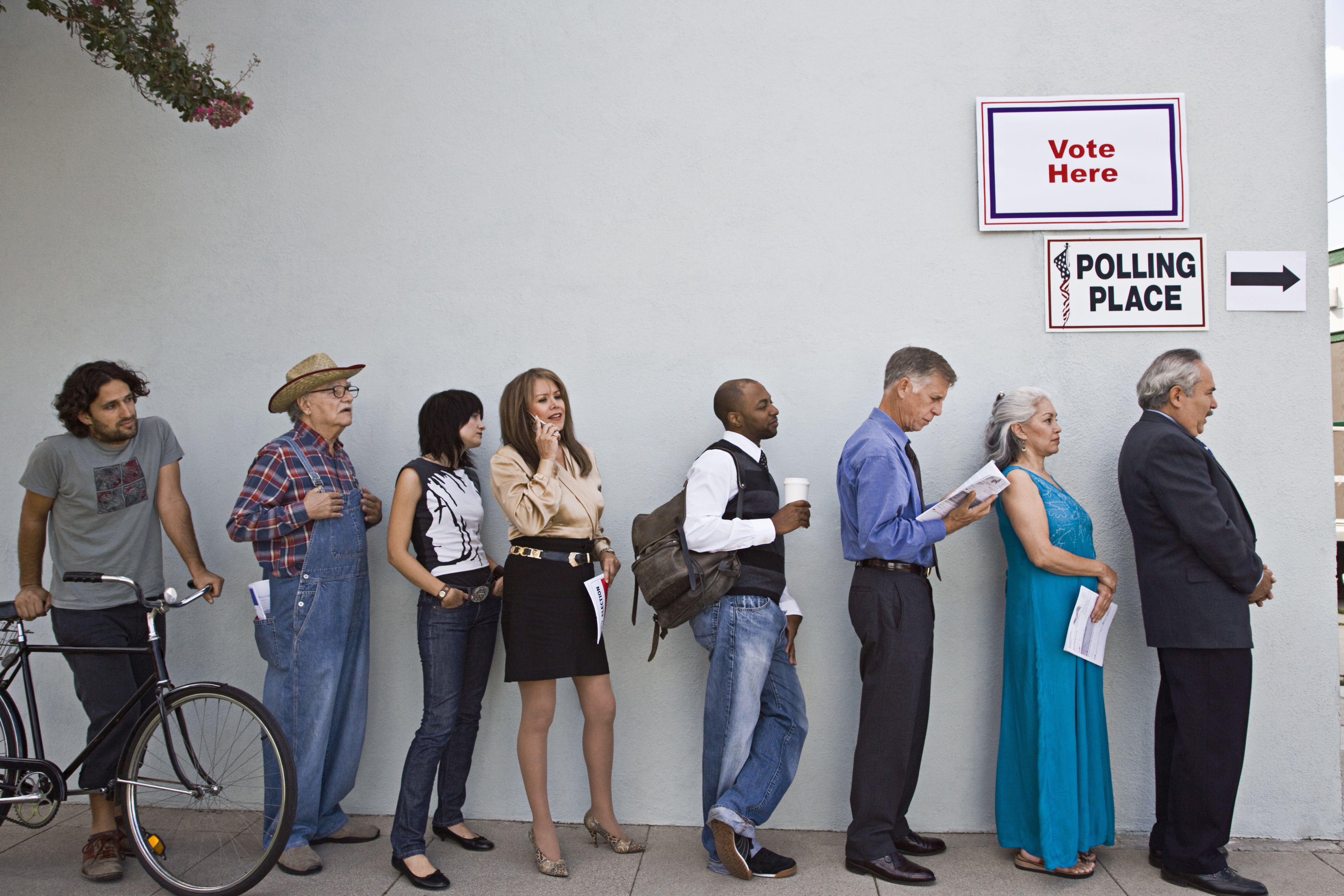 People waiting in line at a polling place
