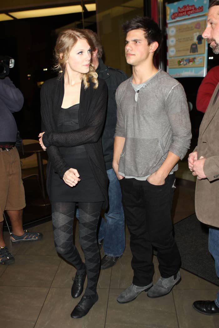 Swift and Lautner standing together