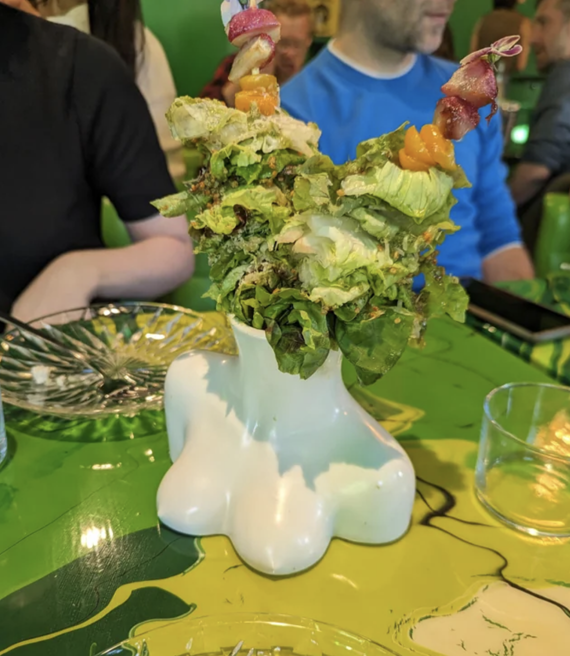 A salad in a glass bust