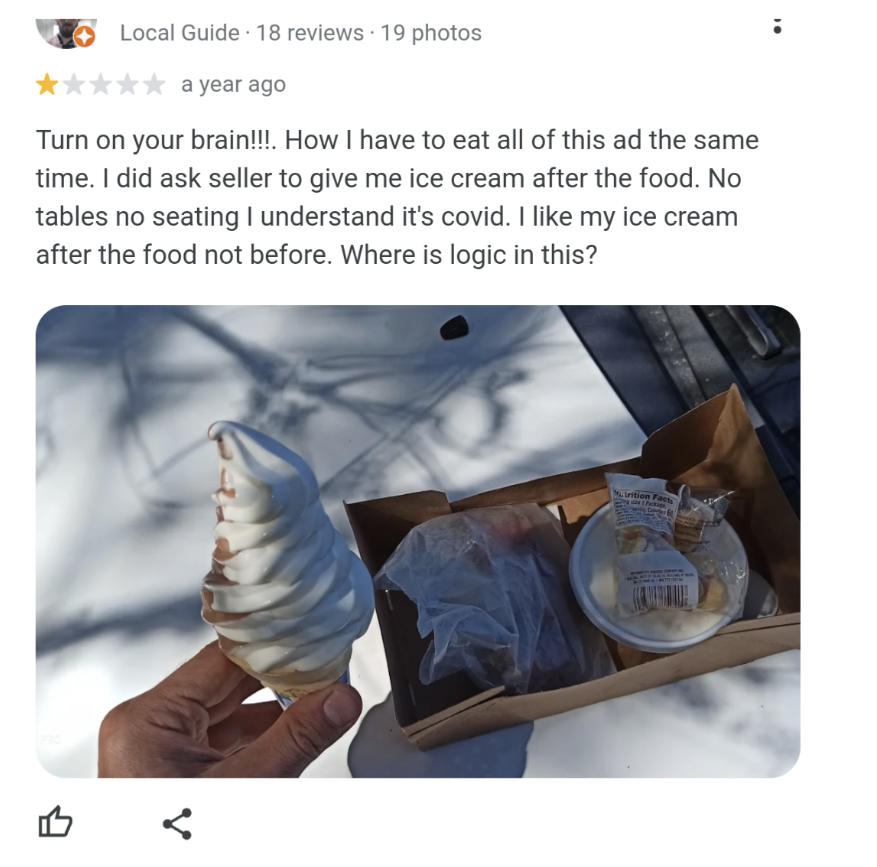person mad that they got all their food, including an ice cream cone, at the same time