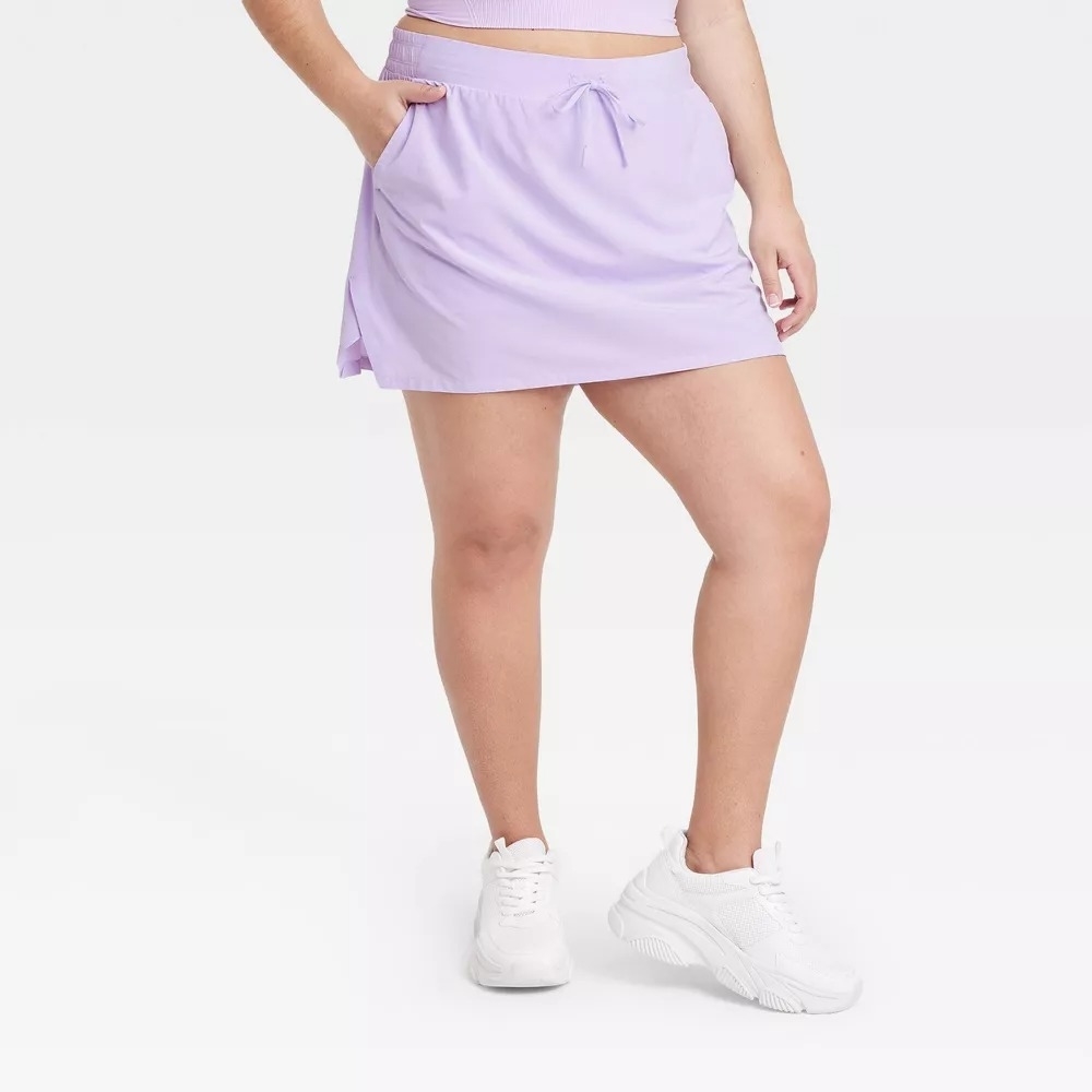model wearing the purple skort