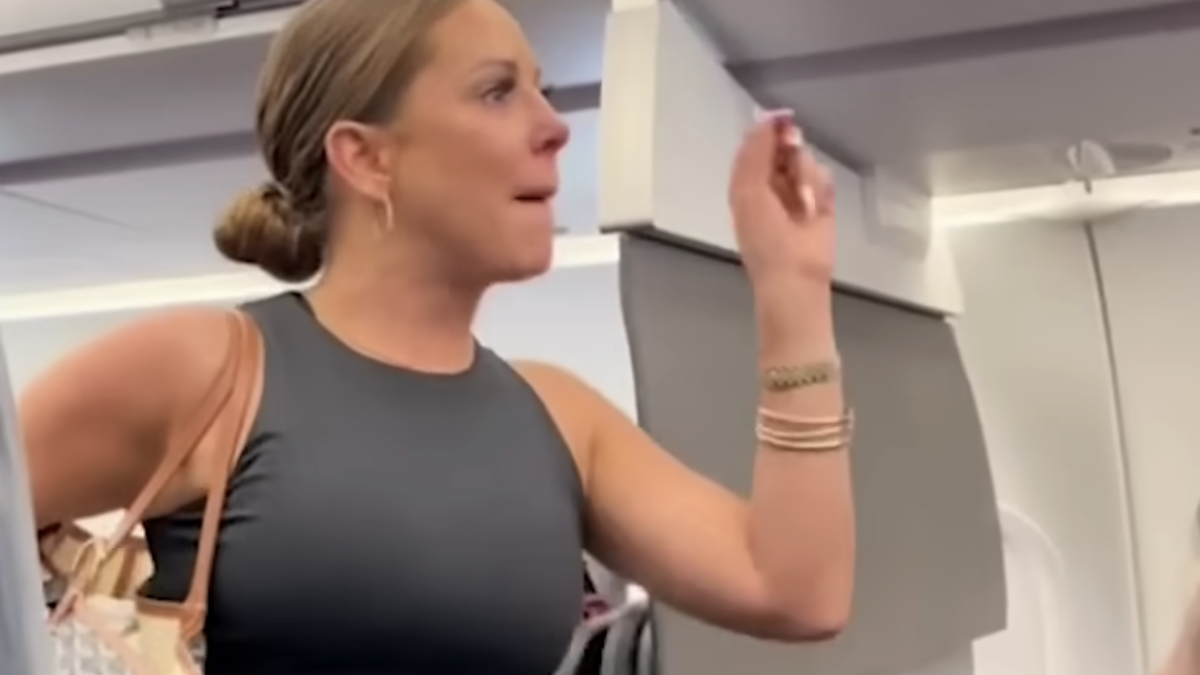 Woman kicked off plane for viral 'not real!' video has new surprise -  TheStreet