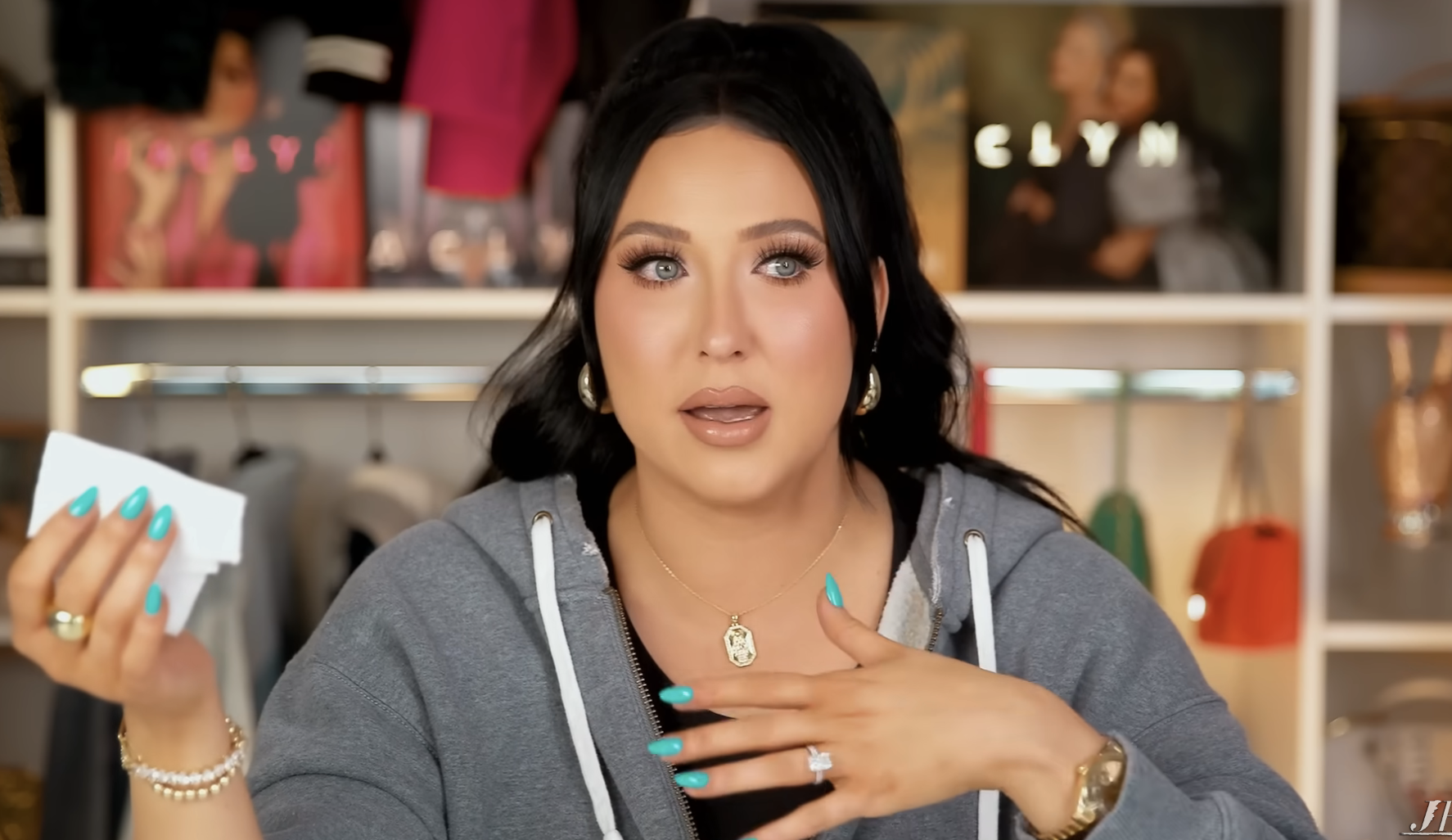 Closeup of Jaclyn Hill holding tissue in her hands