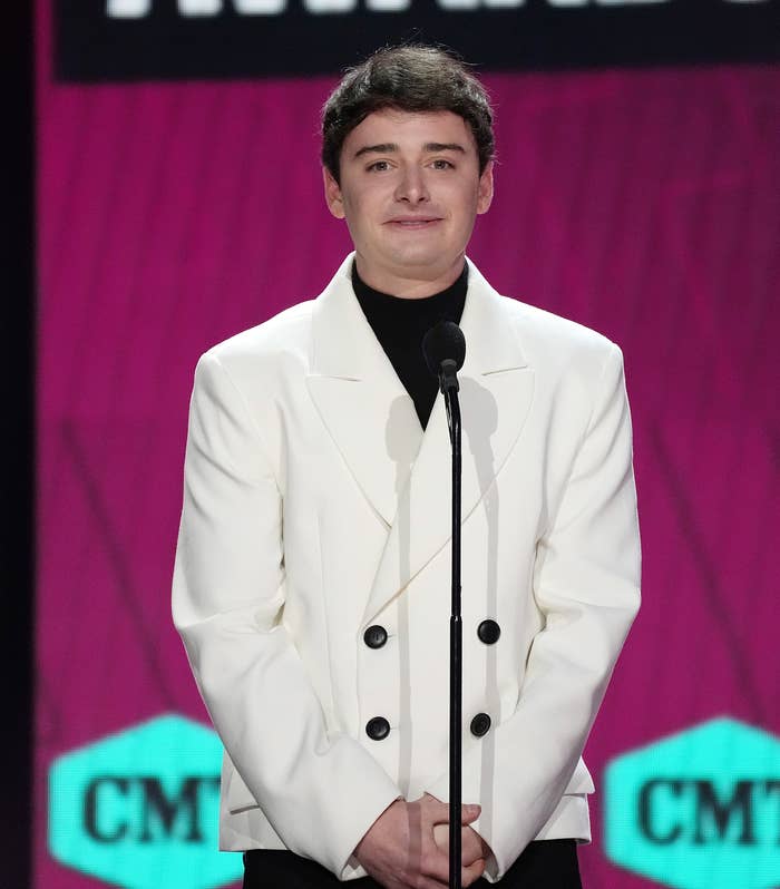 Closeup of Noah Schnapp on stage at the CMT awards