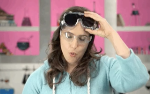 A woman wearing safety glasses