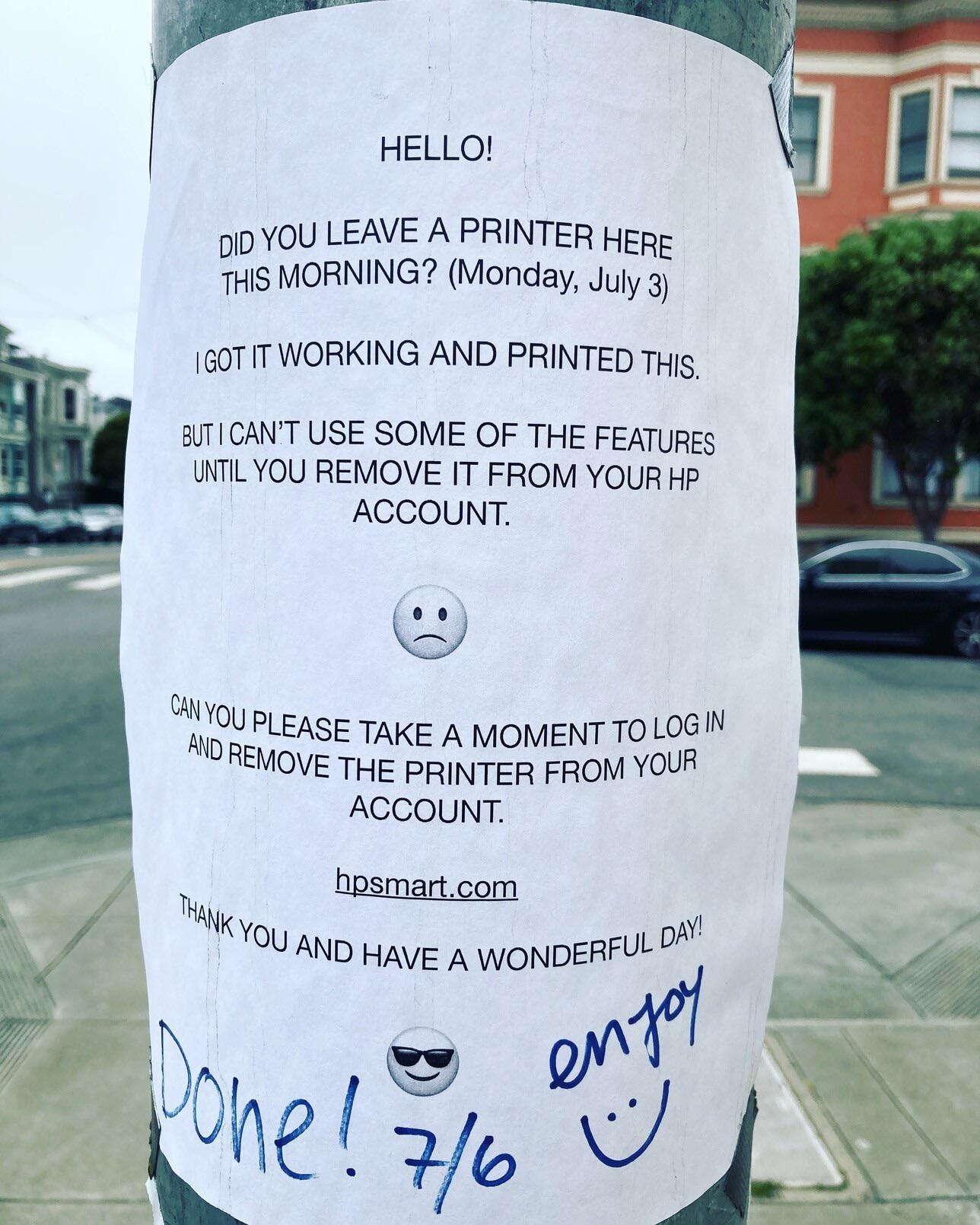 A note on a street pole asking whoever left a free printer there to remove it from their account because they got it to work (and printed the note) but can&#x27;t use all the features, with &quot;thank you, have a wonderful day,&quot; and someone writes &quot;Done! Enjoy&quot;