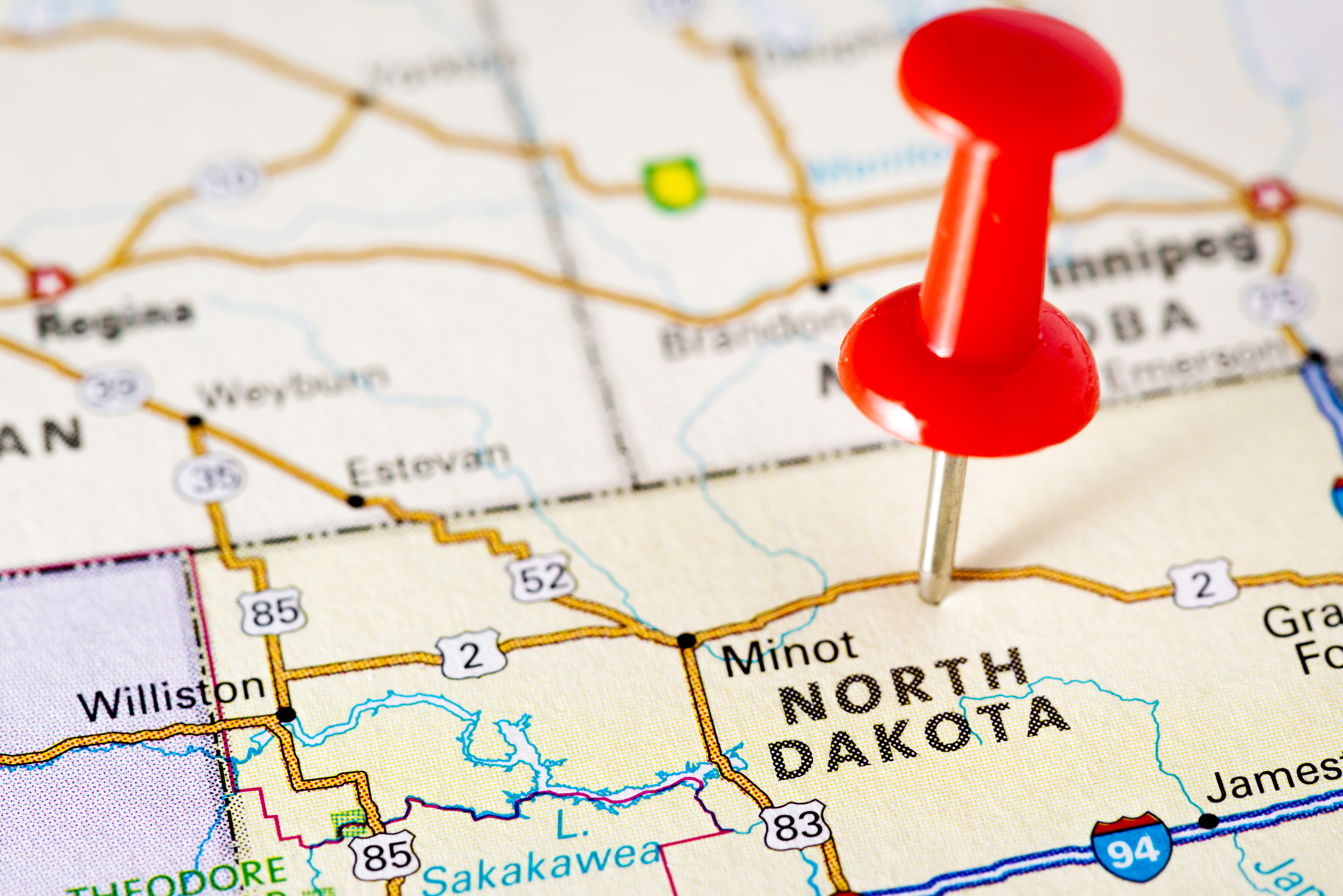 pushpin in a map of north dakota