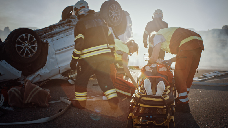 medical emergency crew at the site of a car crash