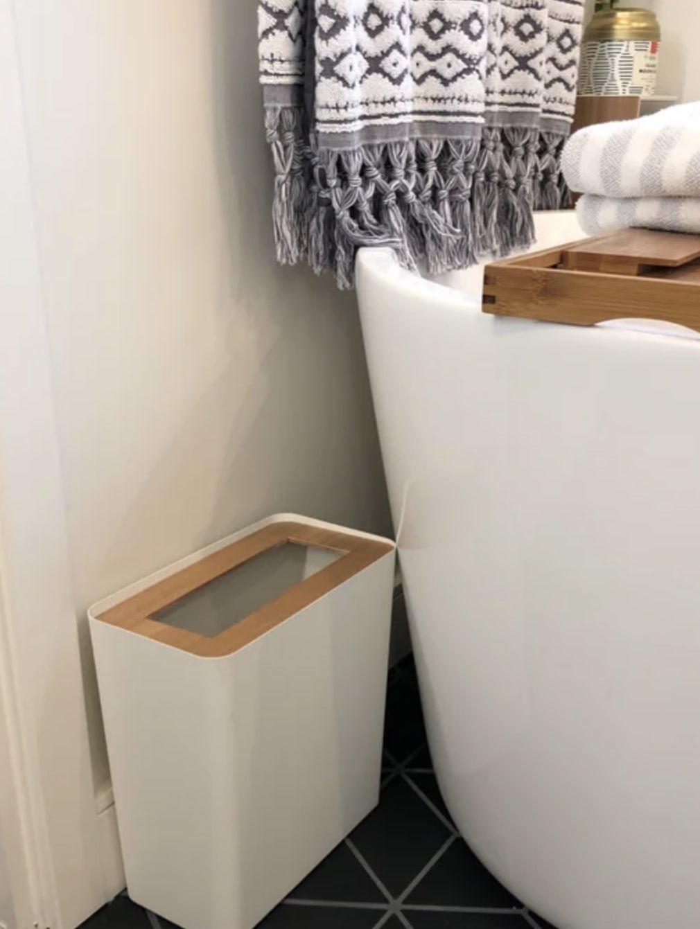 A reviewer&#x27;s bathroom trash can