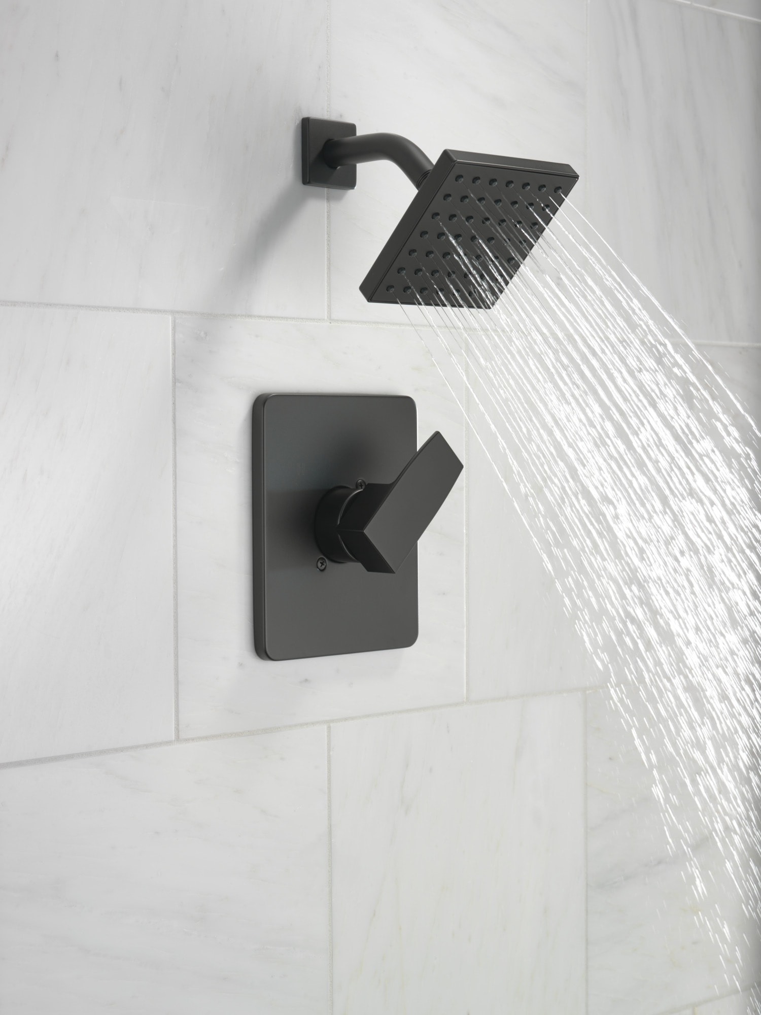 the matte black shower faucet and handle