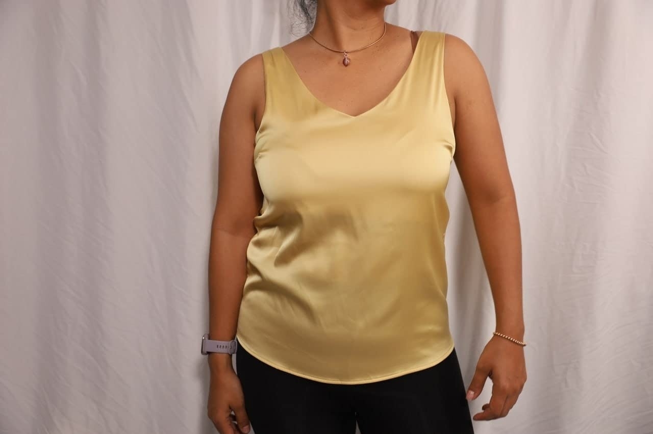 a reviewer wearing the yellow top