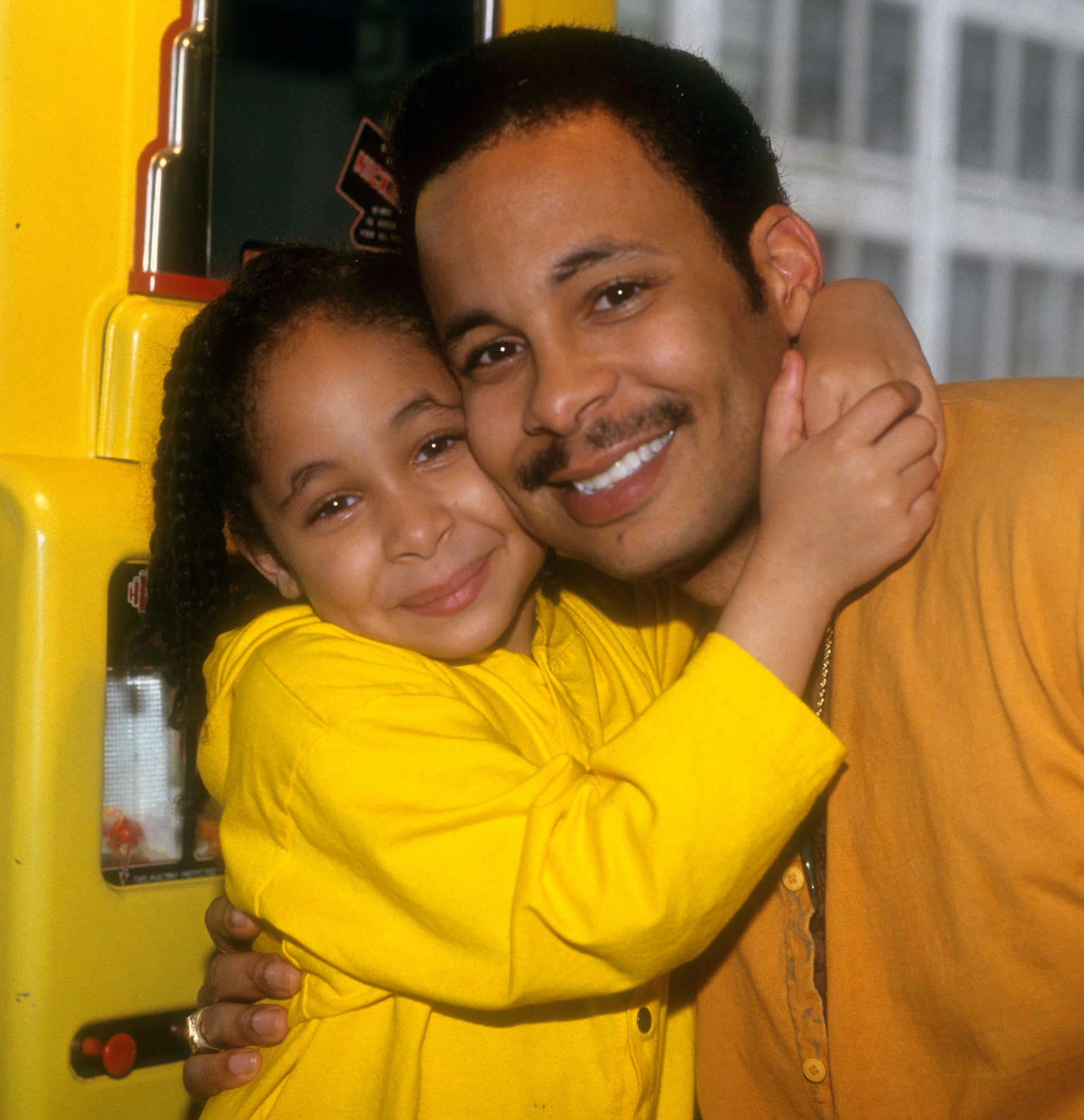 Closeup of Raven-Symoné and her dad, Christopher B. Pearman