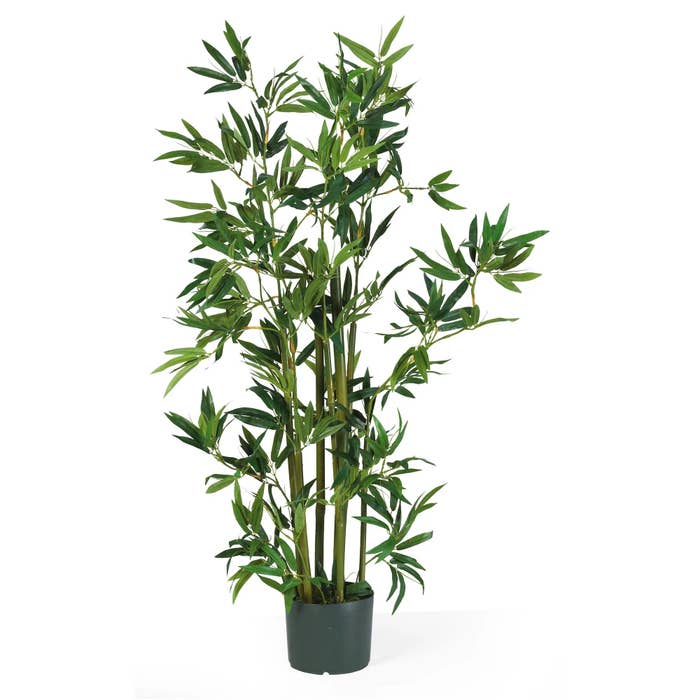 the artificial bamboo plant in a planter
