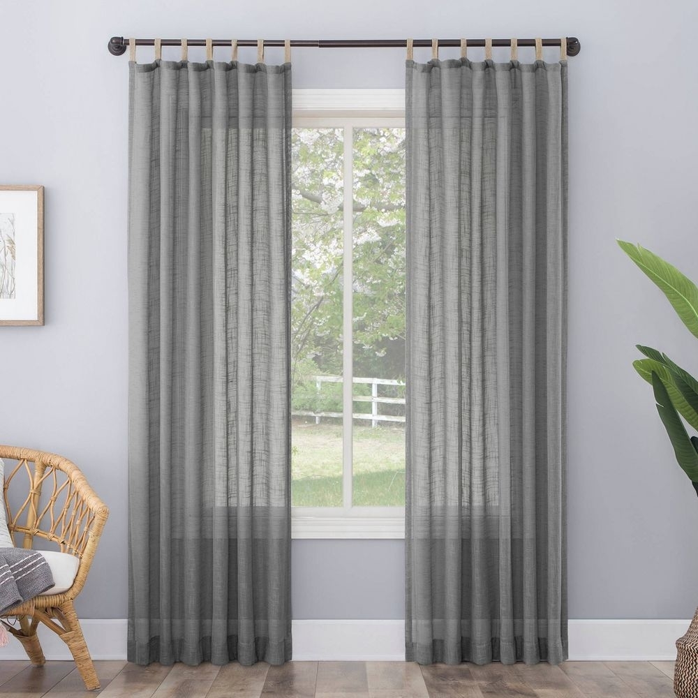 The curtain in grey on a window