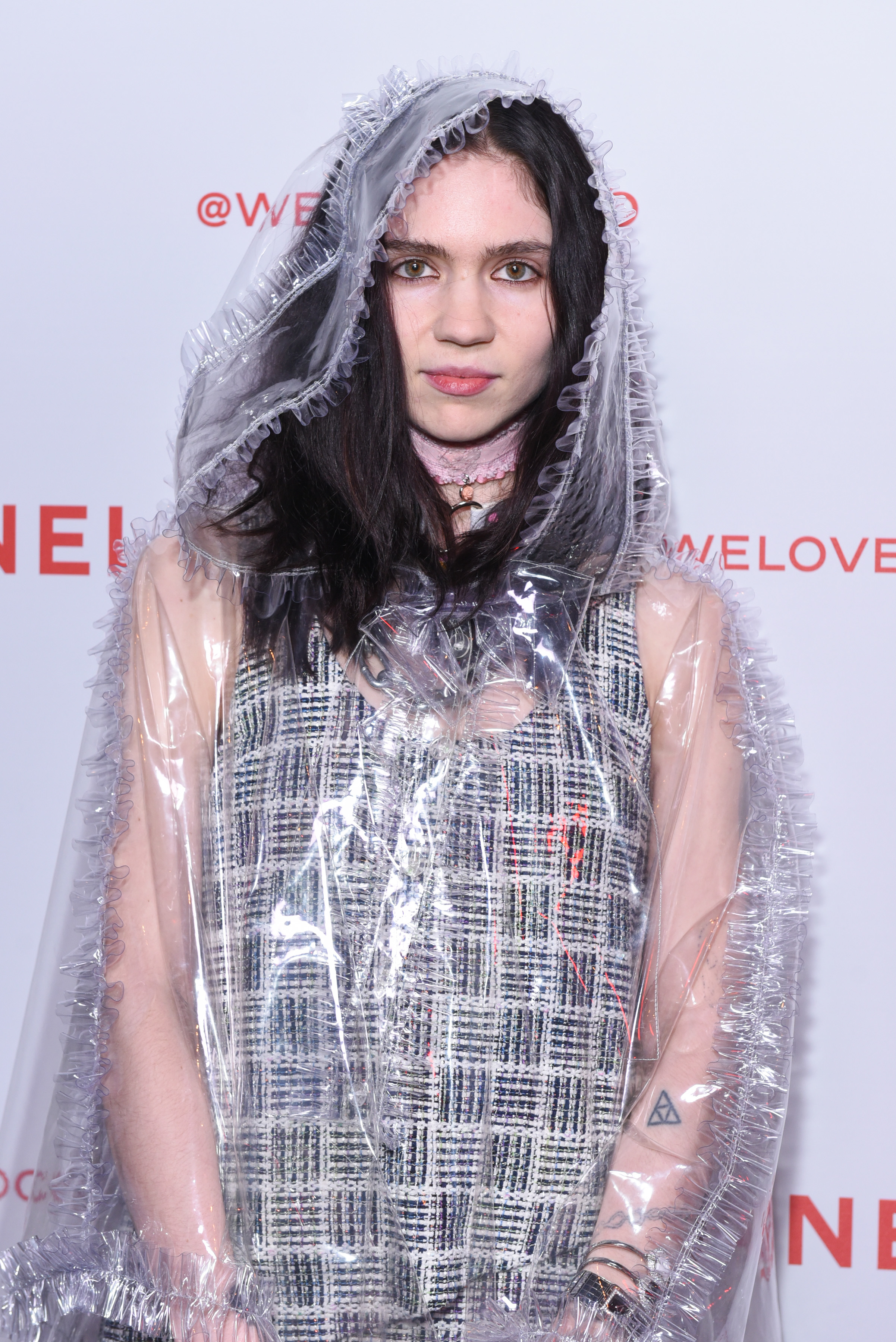 Close-up of Grimes at a media event