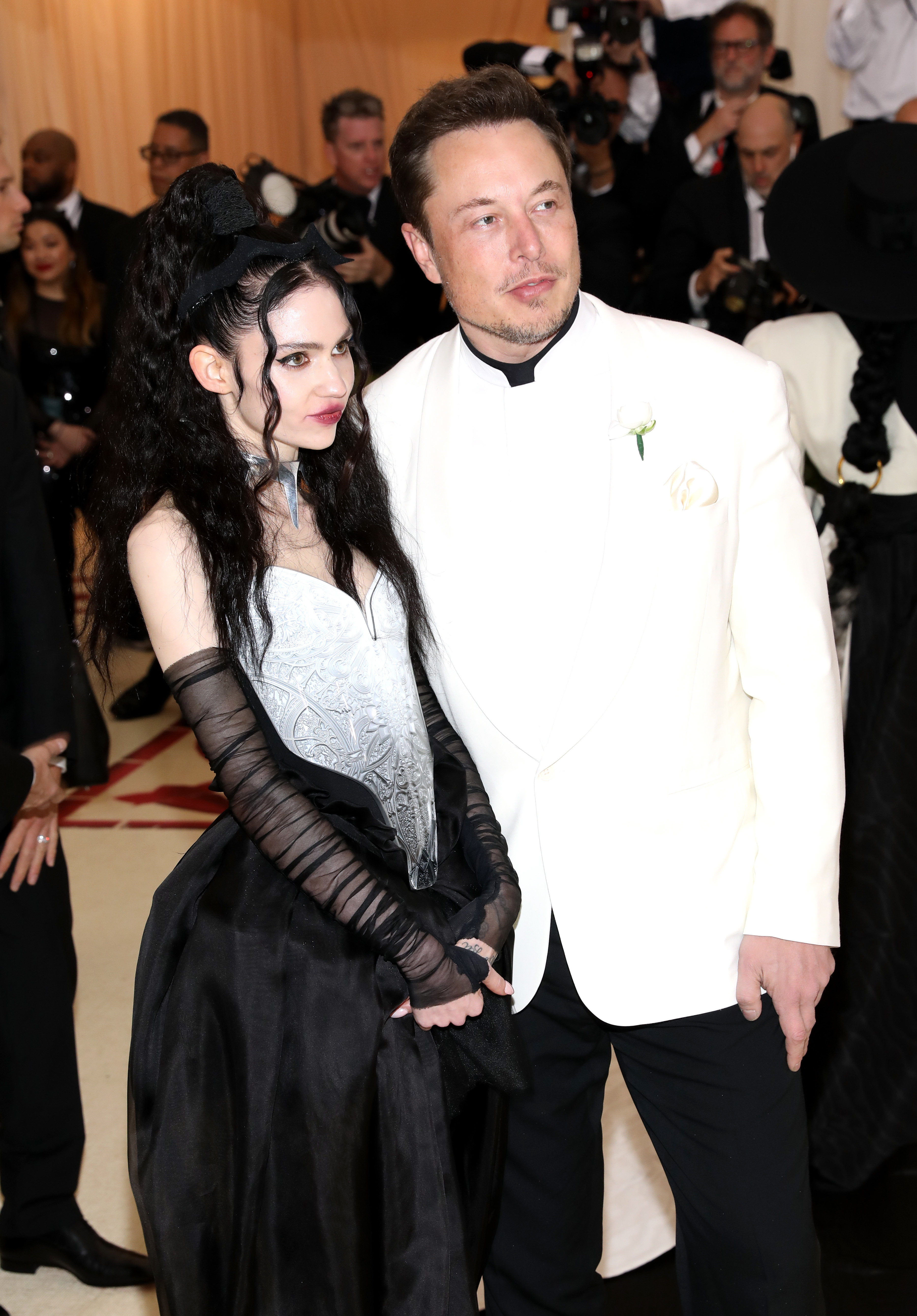 Close-up of Grimes and Elon at a formal event