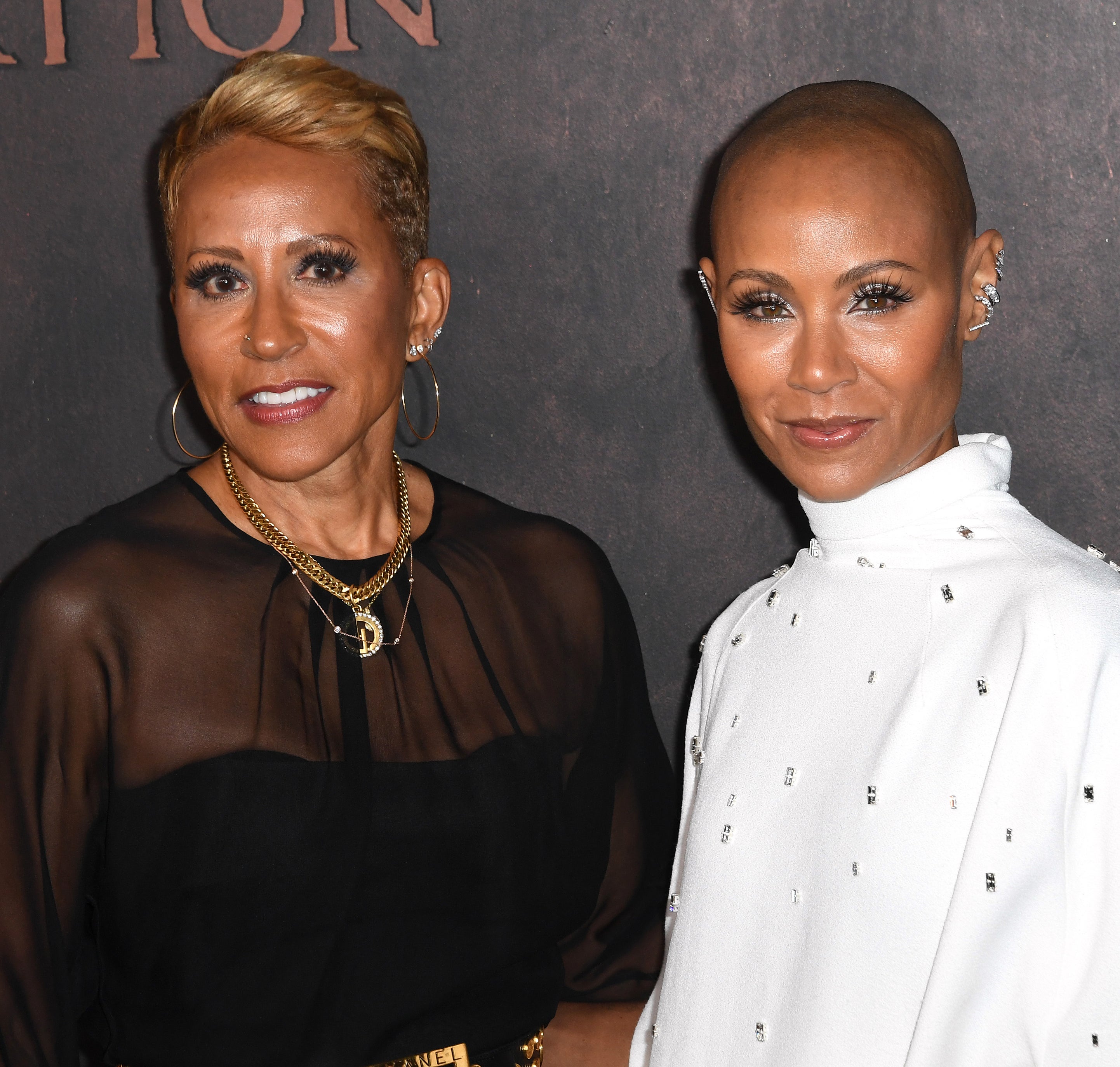 Close-up of Jada and Adrienne at a media event