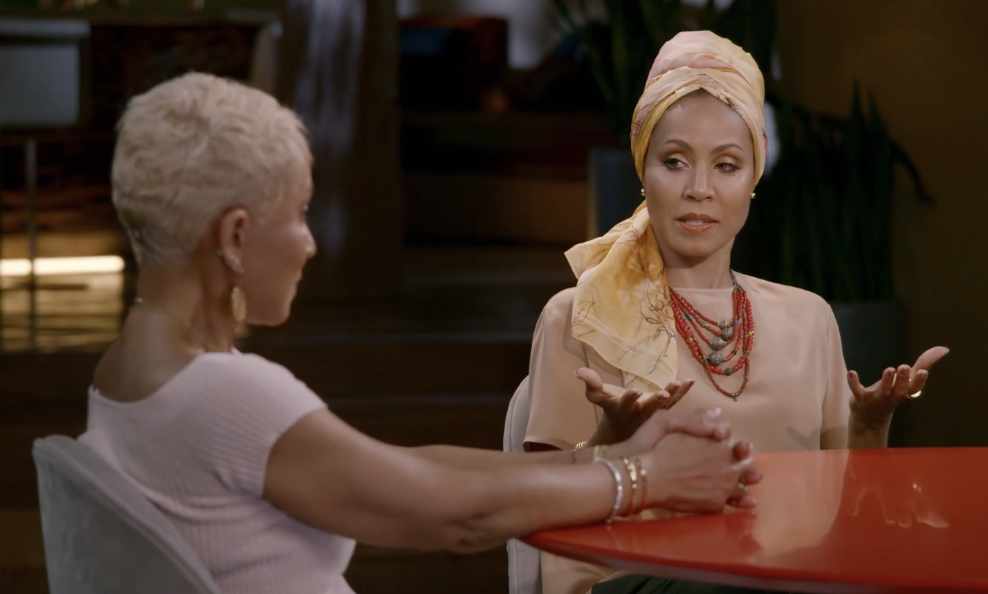 Jada speaking to her mother on an episode of Red Table Talk. Jada is wearing a beautiful head wrap