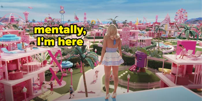 barbie staring out at barbie land with text &quot;mentally, i&#x27;m here&quot;