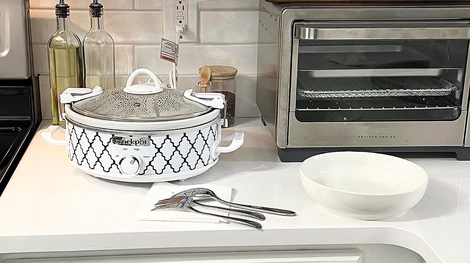 Reviewer image of the patterned slow cooker on their kitchen countertop