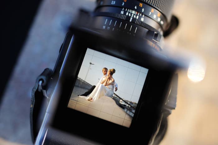 Old-school camera shooting a wedding