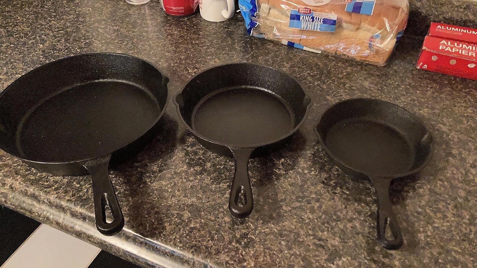 Reviewer image of the three different cast iron skillets