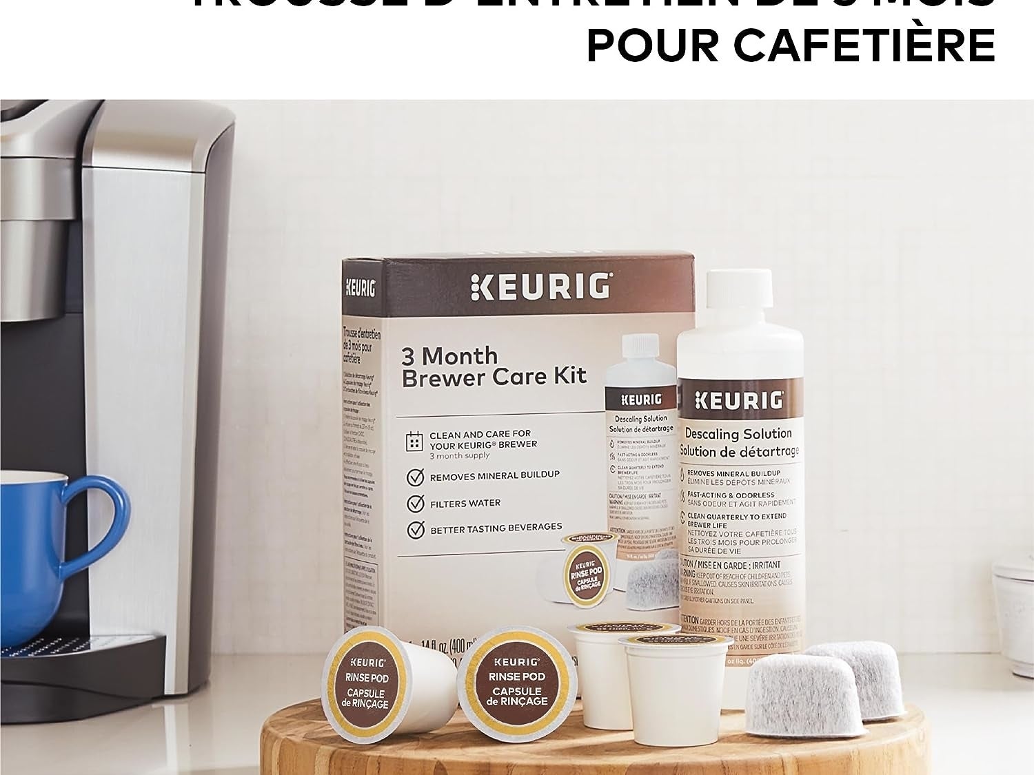 Descaling kit on a wooden board next to a Keurig